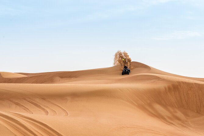 Evening Desert Safari with ATV Quad Bike Dune Bashing BBQ Dinner - Dune bashing and sandboarding on the red dunes