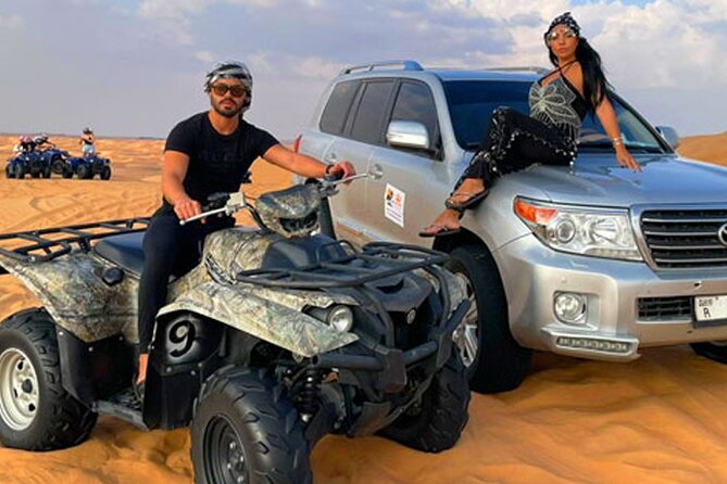 Evening desert safari with camel ride and BBQ dinner - Dune bashing across the red sand