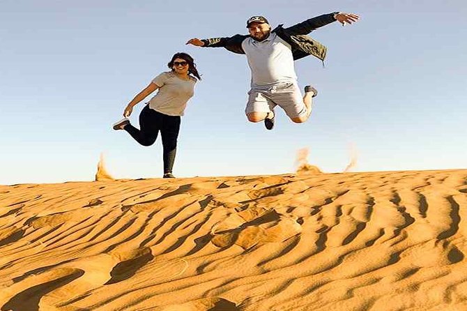 Evening Desert Safari with, Dune Bashing, Camel Ride, sand board - Sunset photos and the desert camp