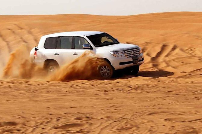 Evening Desert Safari with, Dune Bashing, Camel Ride, sand board - What the $49 price really covers