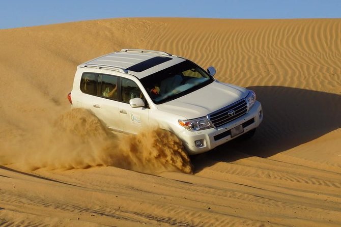 Exhilarating Desert Safari, Including BBQ Dinner from Dubai - From Dubai towers to open sand