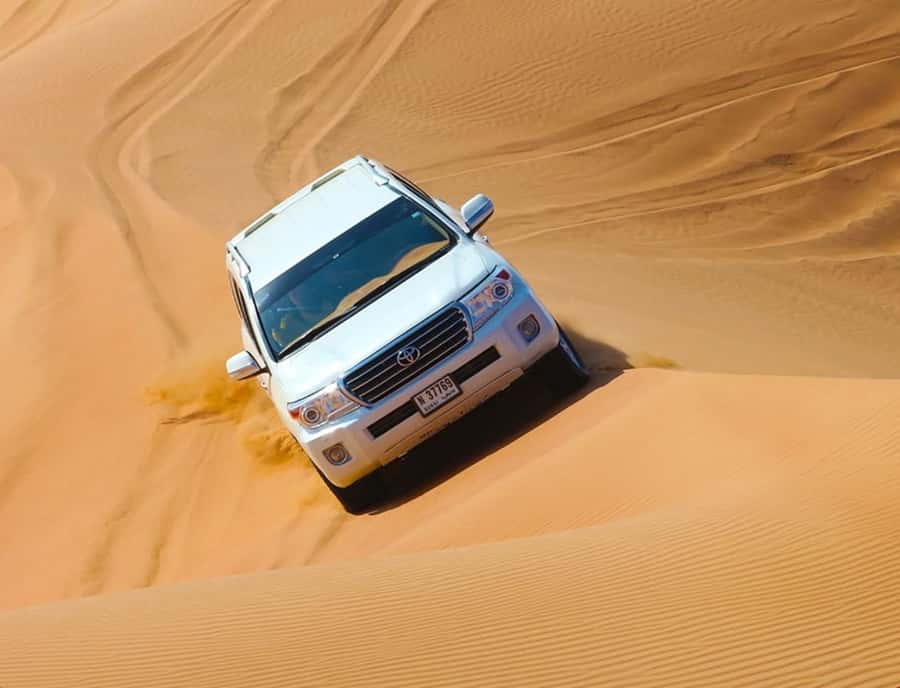 From Doha: Inland Sea Desert Safari with All Activities - A compact desert adventure from Doha