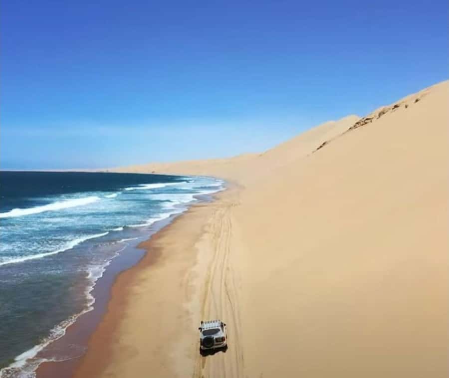 From Doha: Inland Sea Desert Safari with All Activities - The camel ride sets a slower rhythm