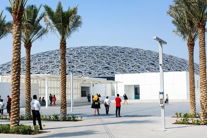 From Dubai: Abu Dhabi Full-Day Trip with Louvre & Grand Mosque - Sheikh Zayed Grand Mosque: one hour of marble and light