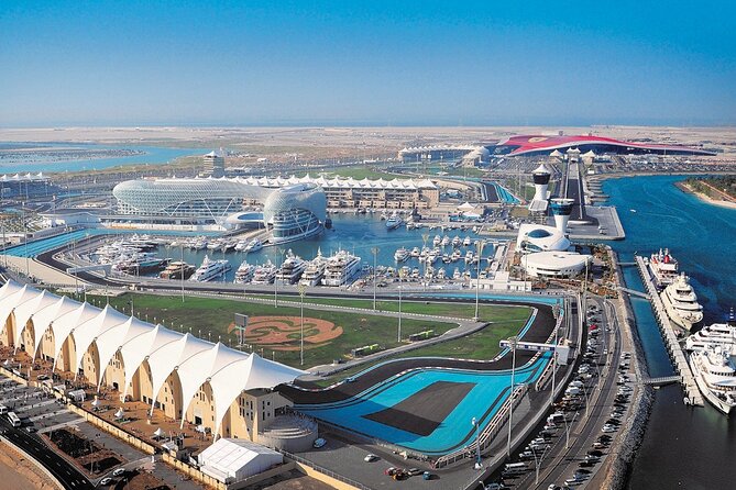 From Dubai: Abu Dhabi Premium Full-Day Sightseeing Tour & Louvre - Last Exit turns the highway stop into a short break
