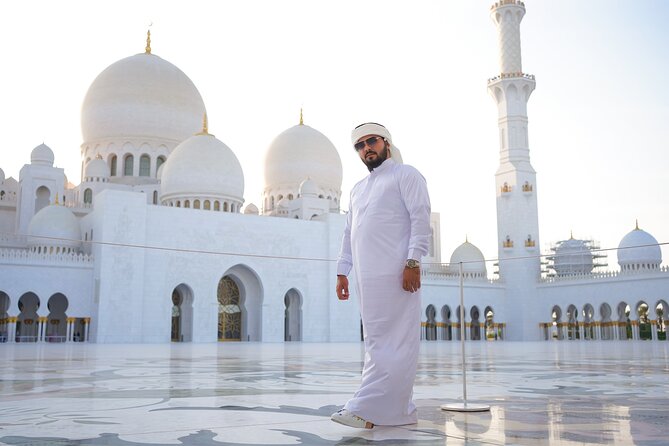 From Dubai: Abu Dhabi Sheikh Zayed Grand Mosque Guided Tour - The courtyards, marble, and reflective pools