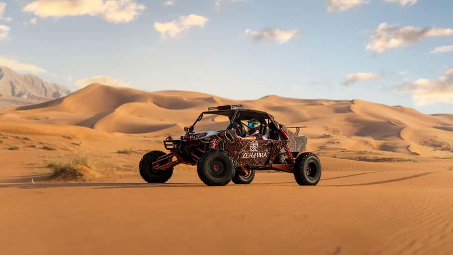 From Dubai: Zerzura Dune Buggy Experience & Fossil Discovery - Sandboarding at Camel Rock