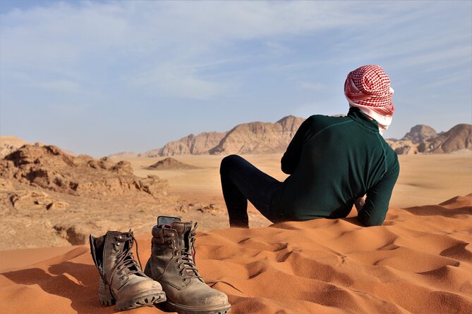 Full Day 4x4 Classic Desert Tour with overnight in private tent - Khazali Canyon, a short walk into the rock