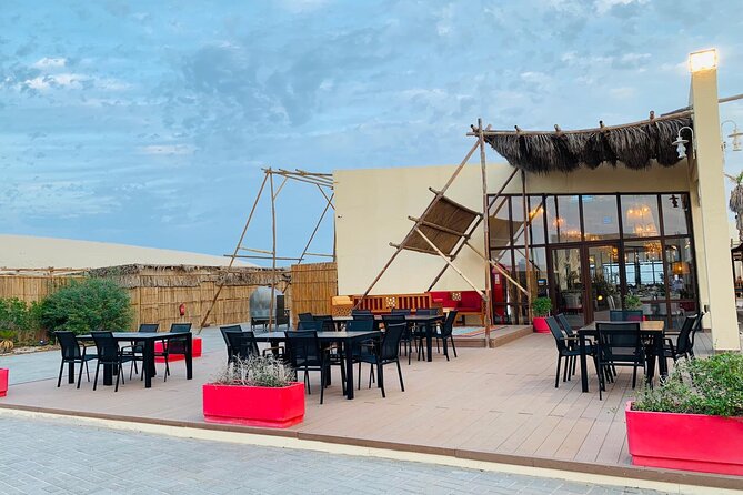 Full-day Qatar desert safari: dune bashing, sandboarding, camels - From Doha to Sealine, where the sand begins