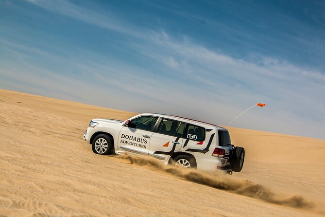 Full-day Qatar desert safari: dune bashing, sandboarding, camels - Dune bashing toward Khor Al Adaid