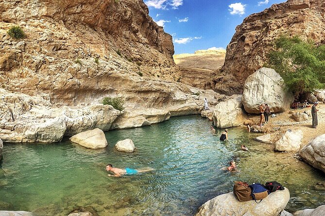 Full-Day Wahiba Desert and Wadi Bani Khalid Group Tour - Wadi Bani Khalid: pools, palms, and mountain villages