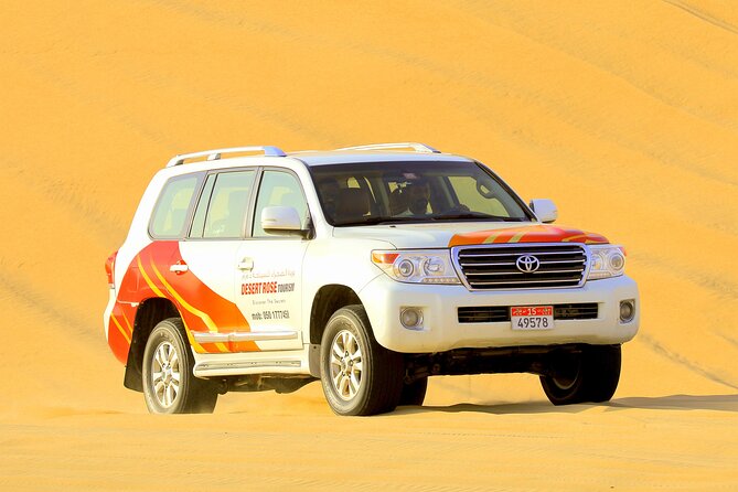 Half-Day Desert Safari from Abu Dhabi - Sandboarding on the dunes