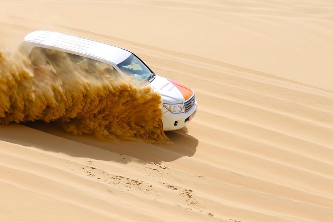 Half-Day Desert Safari from Abu Dhabi - BBQ dinner and three styles of entertainment