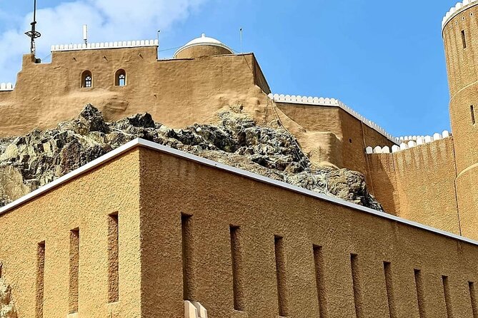 Half-Day Private Muscat City Tour - Top Landmarks in Just 4 Hours - Portuguese forts and the final parliament photo stop
