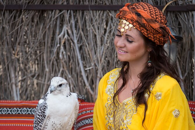High Red Dunes with Camel Ride, Sandboarding, Falcon Show and VIP BBQ Dinner - Belly dancing, Tanoura, and the evening show