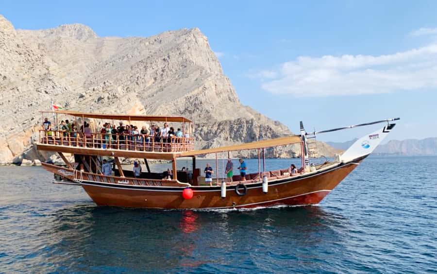 Khasab: Dolphin Watching Day Tour with Snorkeling & Lunch - Cruising past Nadifi and Qanah