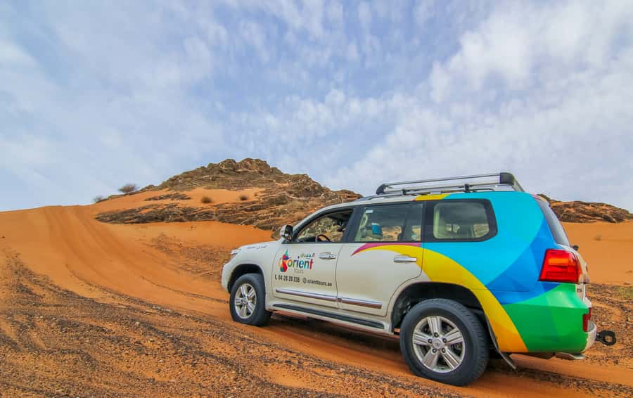 Mleiha Desert Safari with Sandboarding, Stargazing & Dinner - Sunset, rocks, and the best photo stops