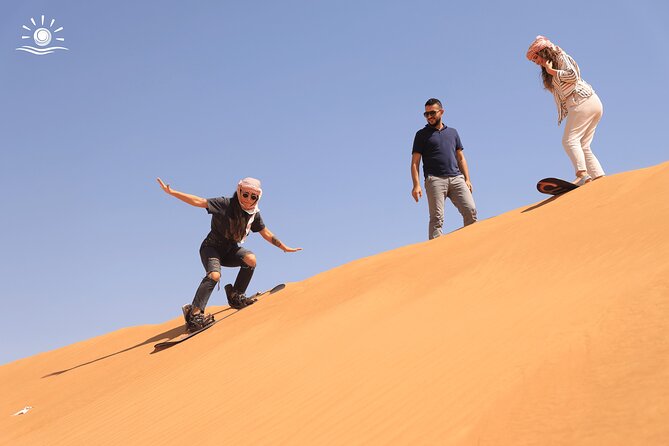 Morning Desert Safari in Dubai with Camel Ride - Sandboarding on the dunes