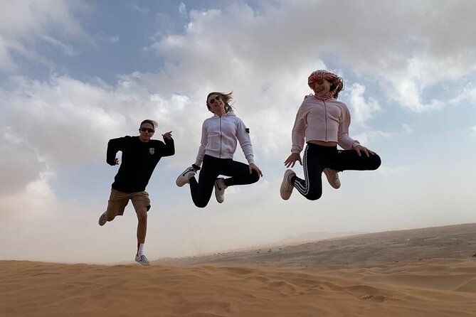 Morning Desert Safari, Quad Bike, Sandboard and Camel Ride - Dune bashing across Lahbab