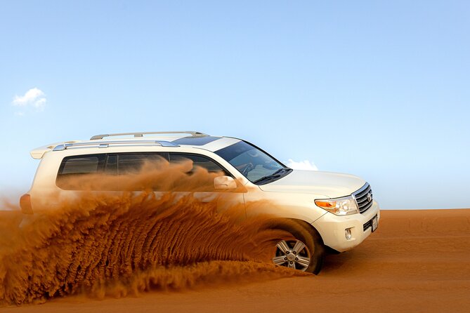 Morning Desert Safari, Quad Bike, Sandboard and Camel Ride - Sandboarding and the main photo stop