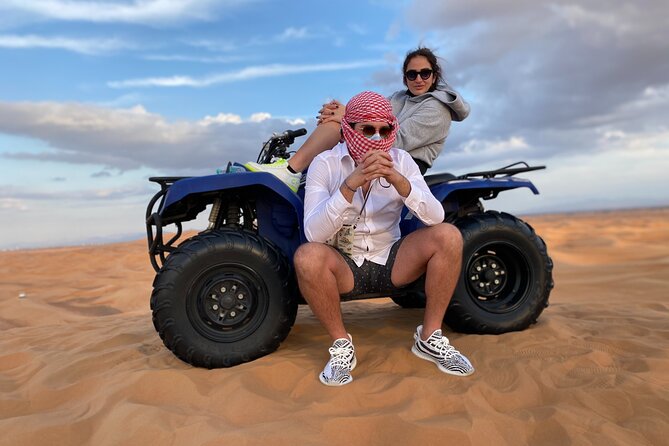 Morning Desert Safari, Quad Bike, Sandboard and Camel Ride - Returning to Dubai with refreshments