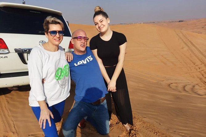 Morning Desert Safari With Quad Bike - Sandboarding, camel rides, and photo stops