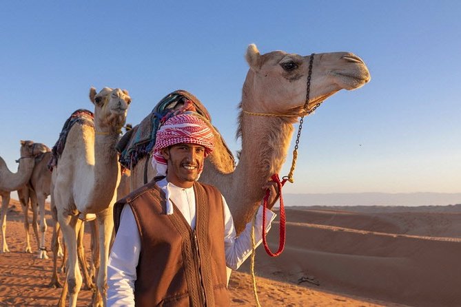 Morning Desert Safari with Quad Bike, Camel Ride & Sandboarding - Dune bashing in the Land Cruiser