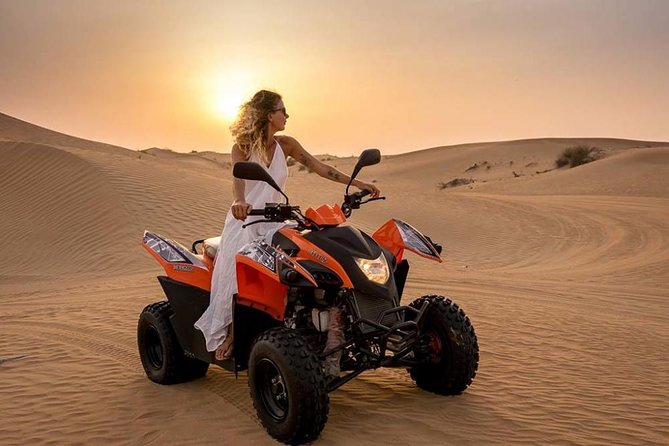 Morning Desert Safari with Quad Bike, Camel Ride & Sandboarding - Sandboarding on the red dunes