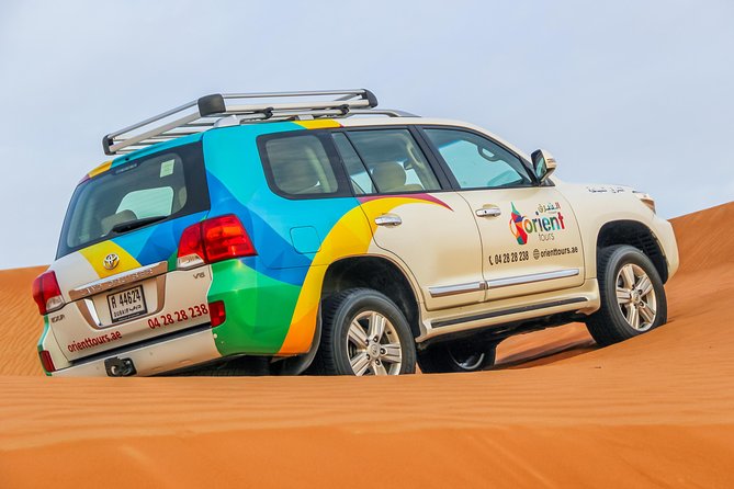Morning Dubai Desert Safari with Camel Ride & Sand boarding - Leaving Dubai for the open desert