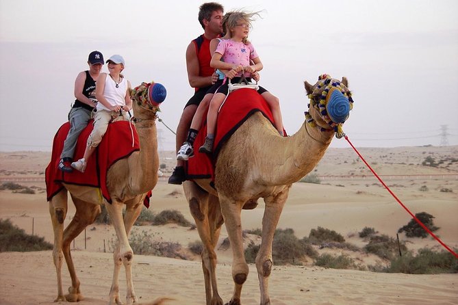 Morning Dubai Desert Safari with Camel Ride & Sand boarding - Deflating the tires before the dune drive