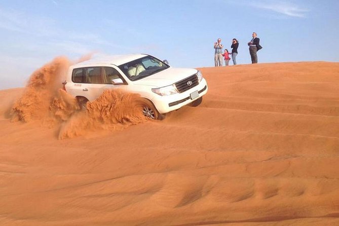 Morning Red Dunes Desert by Quad Bike, Dune Bashing, Camel Ride & Sandboarding - What this four-hour Lahbab trip is really like
