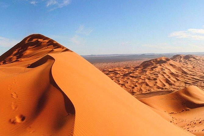 Morning Red Dunes Safari: Camel Ride & Sandboarding Adventure - The red dunes of Lahbab