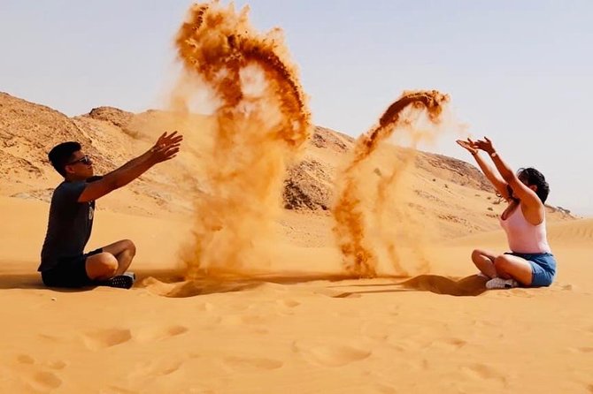 Morning Red Dunes with Camel Ride, Sandboarding and Refreshments - Arabic coffee, dates, and Lukaymat