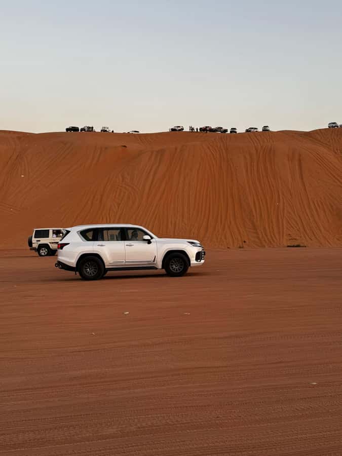 Muscat: Bidiya Desert Sunset Camel Ride with Transfer - Sunset on the dune