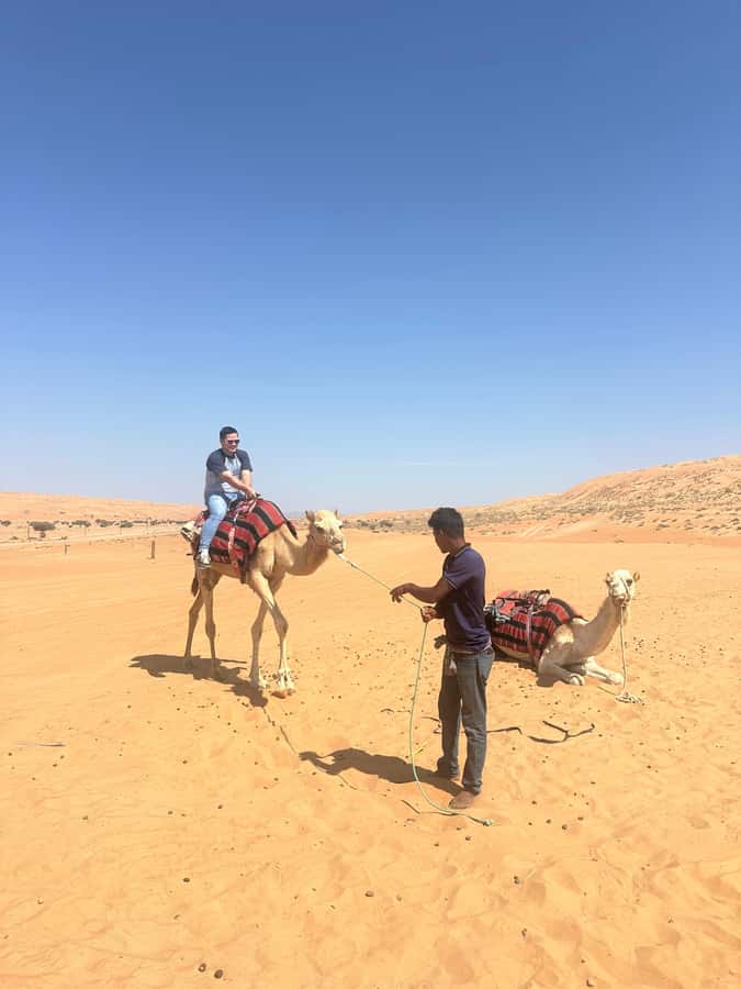 Muscat: Bidiya Desert Sunset Camel Ride with Transfer - The value of a $470 private group