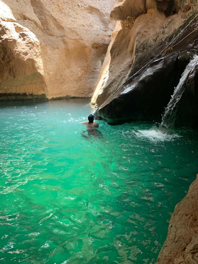 Muscat: Full-Day Wadi Shab & Bimmah Sinkhole Private Tour - Swimming through the pools and cave