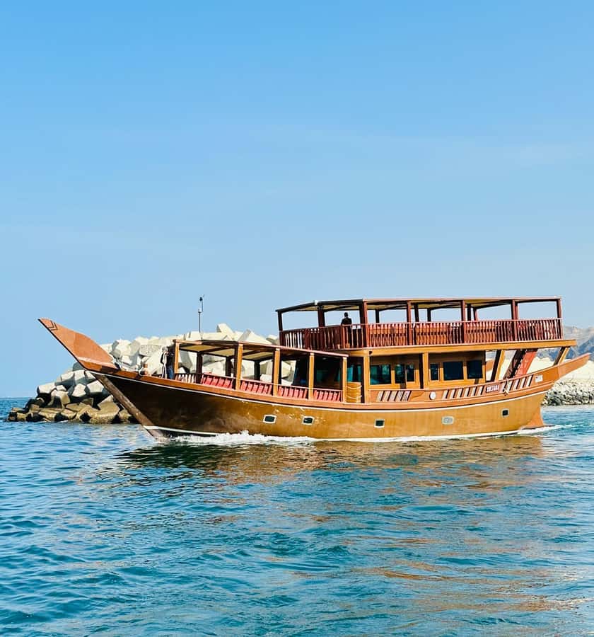 Muscat: Omani Dhow Coastal and Sunset Cruise - Coffee, dates, and the Omani welcome