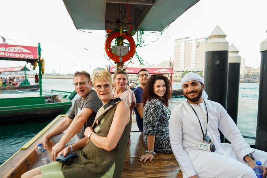 Old Dubai: Premium Guided Tour with Street Food & Abra Ride - Guides, languages, and group rhythm
