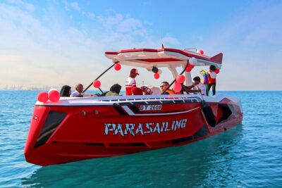 Parasailing in Dubai with Palm Jumeirah and JBR Beach views