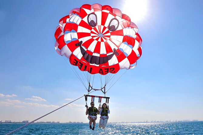 Parasailing in Dubai with Palm Jumeirah and JBR Beach views - Safety, weather, and the limits of control