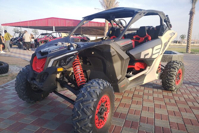 Polarize Dune Buggy 1000cc in Red Dunes Desert - Sandboarding and a camel ride at the camp
