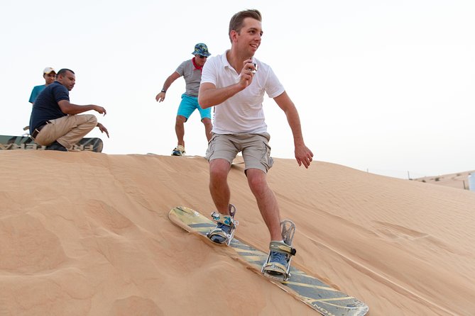 Premium Dubai Desert Safari with BBQ Dinner in the Red Dunes - Sandboarding on the Red Dunes