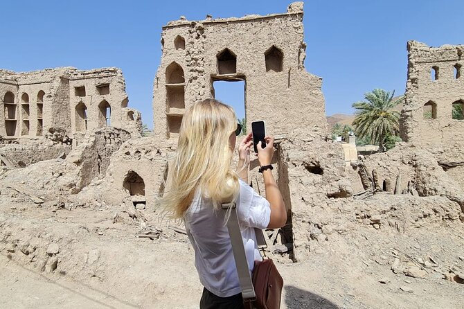 Private Day-Tour in Nizwa and Jebel Akhdar - Birkat Al Mouz: ruins beside green plantations