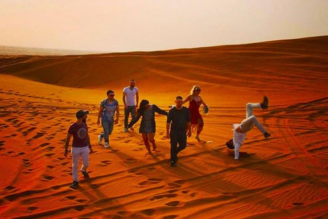Private Desert Safari Red Dune with BBQ, Sand Boarding and Camel Ride - Sunset, a camel farm, and a short ride