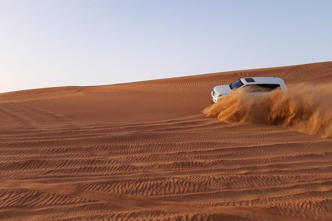 Private Desert Safari Red Dune with BBQ, Sand Boarding and Camel Ride - The Arabian-style camp after dark