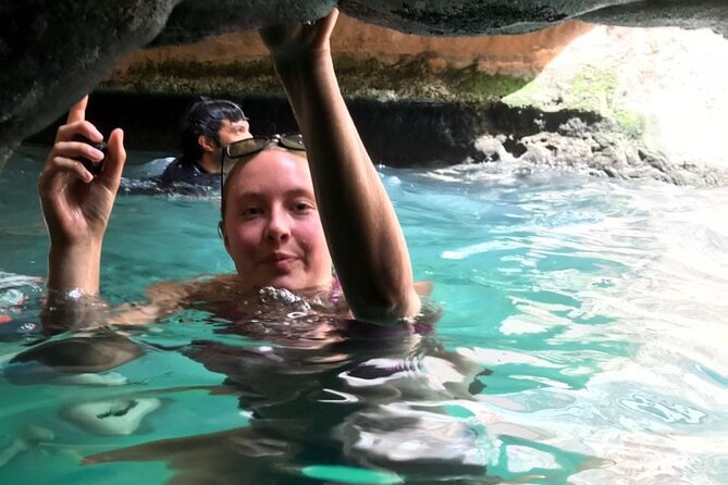 Private Full-Day Wadi Shab and Bimmah Sinkhole Tour - Swimming through the pools and cave