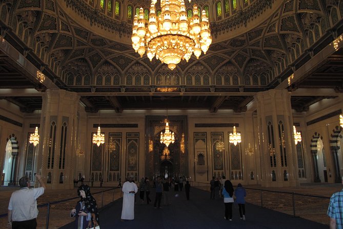 Private Half-Day Muscat City Tour - Entering the Sultan Qaboos Grand Mosque