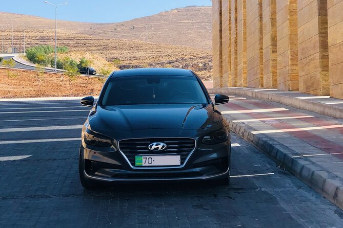 Private Jordan Transportation - Airport arrival with Anas and a name board