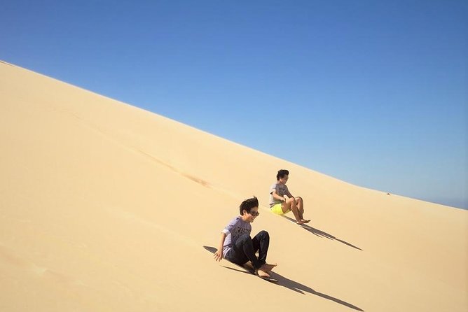 Qatar Gold Dune Safari, Dune Bashing,Camel Ride,Sand Boarding,Inland Sea Desert - Sandboarding on the golden dunes