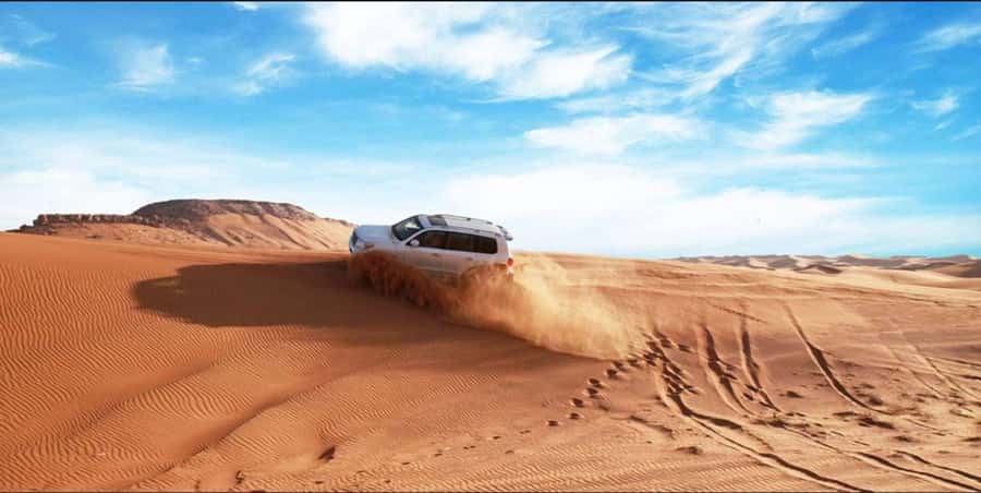 Quad Bike/Buggy, Desert Safari, Camel Ride, Dune Bashing - Quad biking gives you control, and responsibility